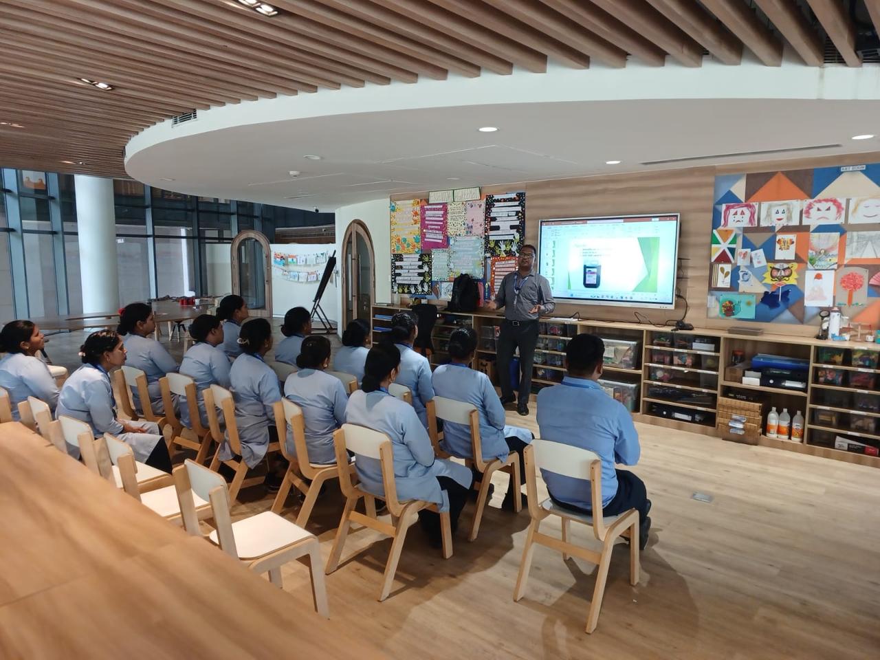 Training session with school staff in a classroom